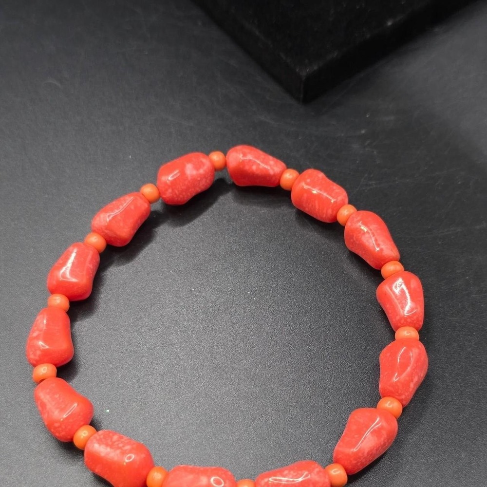 Red coral bracelet with orange beads